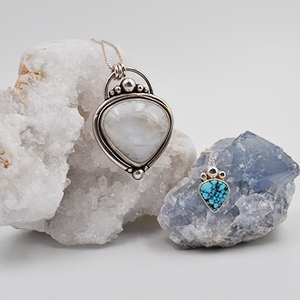Shop all sterling silver pendants and necklaces here. Find one of a kind necklaces ranging from a simple turquoise and sterling silver teardrop necklace to larger bold rainbow moonstone necklace. 